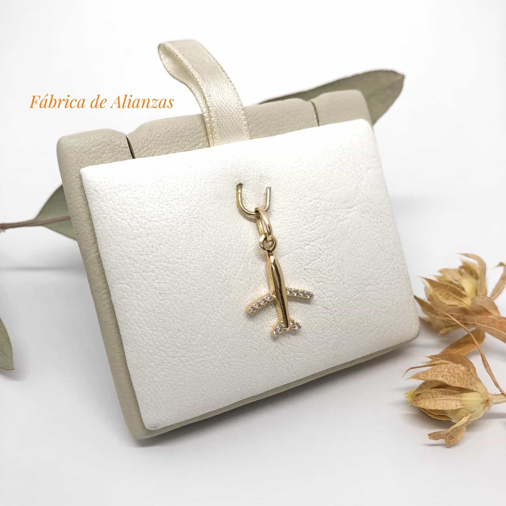 Dije Avión con Piedras Blancas