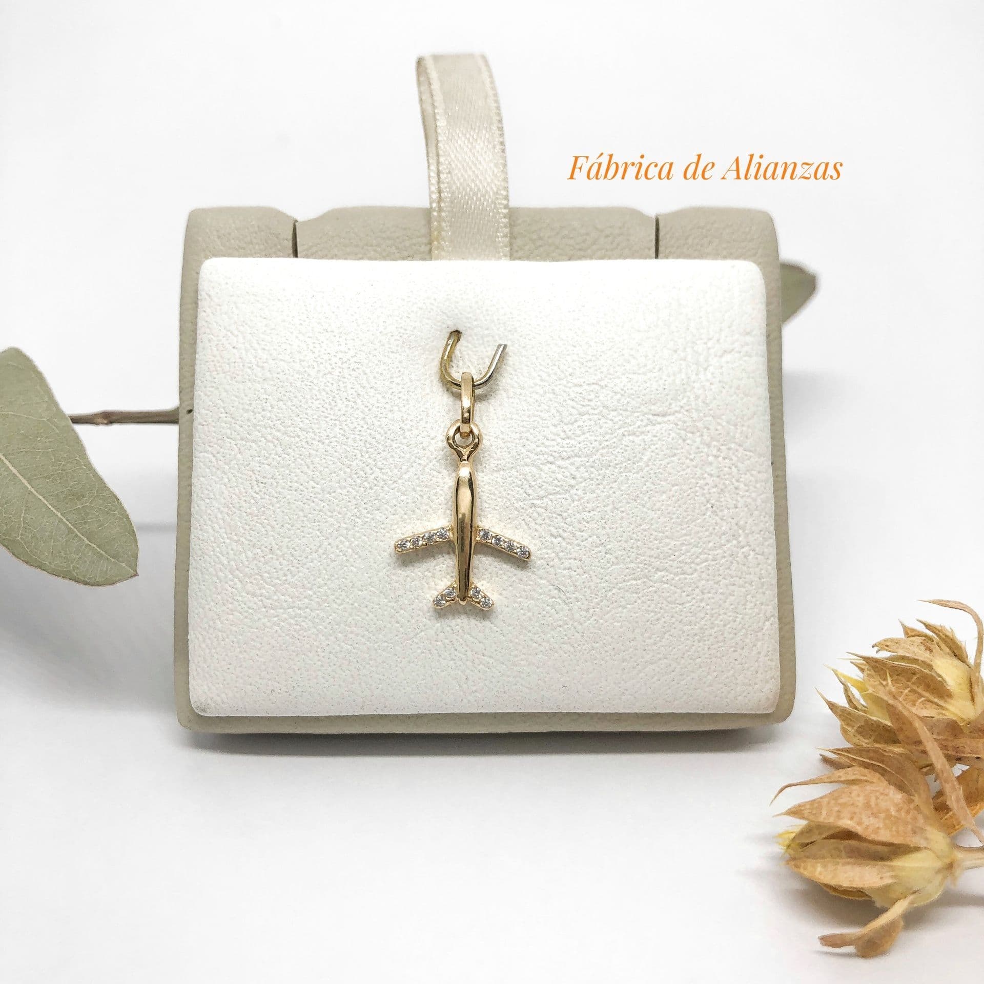 Dije Avión con Piedras Blancas